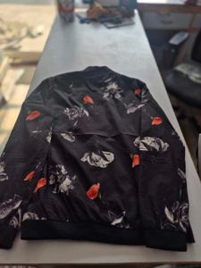 Black colour flora printed varsity jacket for both