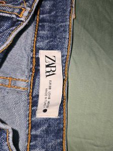 ZARA Ripped Knee Jeans