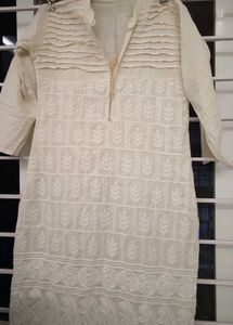 A Cream Shinning Kurthi