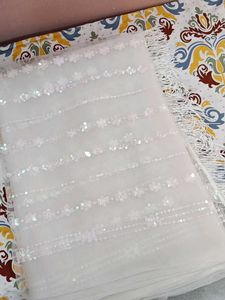 Elegant Embroidered Net Fabric with Fringe