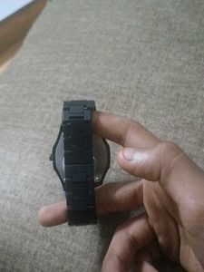 a watch full black and very light weight