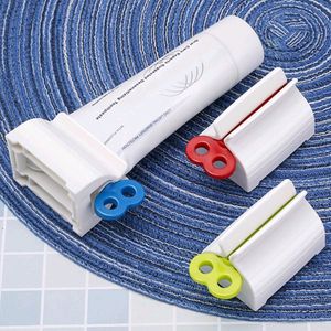 Rolling Tube Toothpaste Squeezer Toothpaste Seat Holder Stand Rotate Toothpaste Dispenser