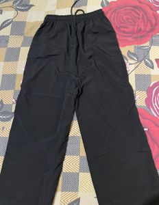 Trendy Black Track Pants with Pink Ribbon