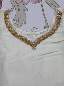 Elegant Cream Kurti with Gold Embellishments