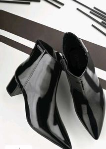 women black heeled Chelsea boots