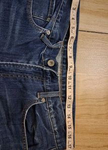 Distressed Blue Denim Jeans