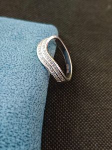Pure silver ring in white zircon.