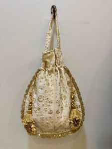 Royal Golden Potli With Tassels