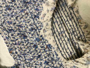 Floral Smocked Peplum Top