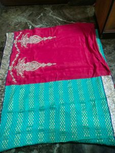 Pink &firoja colour saree.