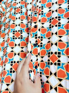 “Yufta” Vibrant Orange Geometric Dress