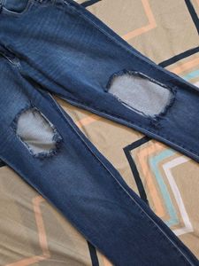 Ripped Knee Jeans