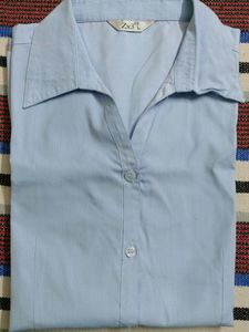 It is blue coloured formal shirt with very good fabric.
