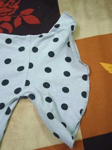 A Grey Top With Polka Dots