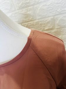 Curved Coral Flute Sleeve Tunic Top