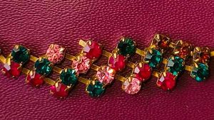 Gold Chained Bracelet With Rare Stones.