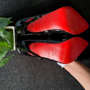 Christian Louboutin Black Patent Leather Pumps