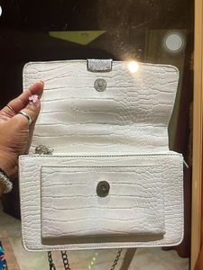 Lino Perros Sling Purse