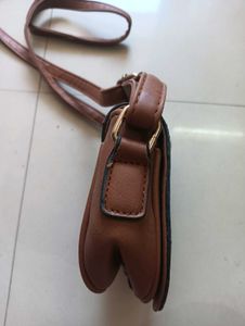 Blue and Brown sling bag