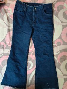 High-Waisted Dark Wash Flared Jeans with Raw Hem