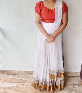 White Net Lehanga And Red Prince Cut Blouse