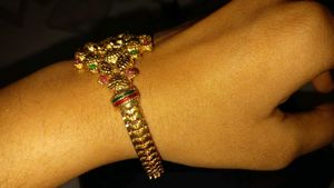 Stunning Gold-Tone Lion Bangle