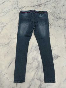 Distressed Denim Jeans