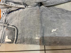 Distressed Gray Denim Jeans