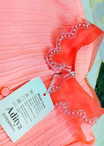 Coral Dress with Pearl Embellishments