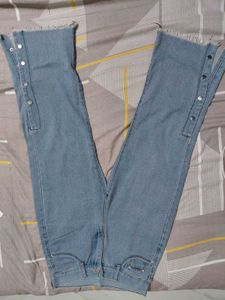 Light Wash Jeans with Button Detail