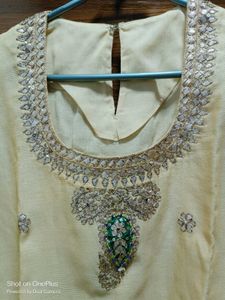Beautiull cream kurti with neck work