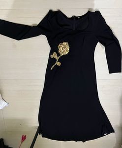 Black Dress with Gold Rose Detail