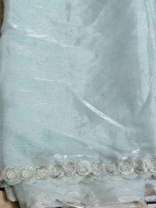 Elegant party organza saree With Stitched Blouse