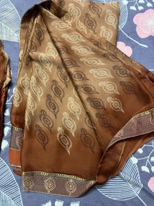 Elegant Brown Patterned Saree