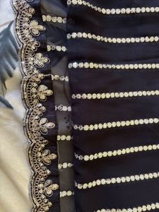Elegant Black Georgette Saree with Graceful Drape