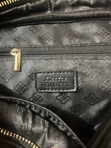 BATA Chic Black crossbag which also acts a sophist