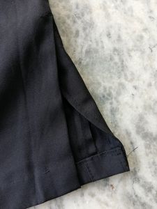 Black mini skirt with side slit