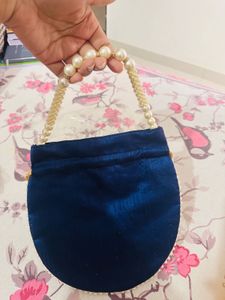 Elegant Heavy Blue Pearl Potli Bag with Tassels