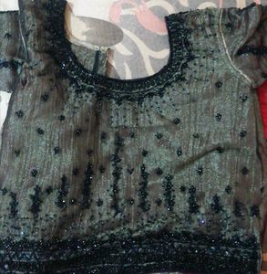 Black-copper Tissue N net skirt and blouse.