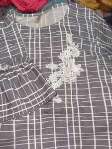 grey and white tunic