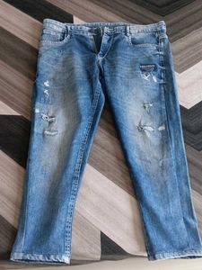Ripped Blue Denim Jeans