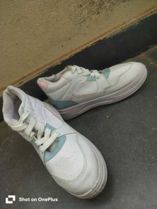 White Sneakers with pastel details