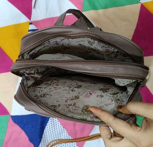 Slightly Used Bagpack With 4 Chain Pockets