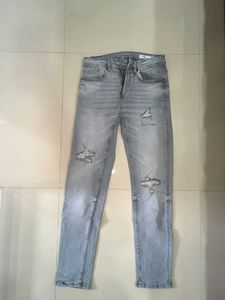 Distressed Gray Skinny Jeans