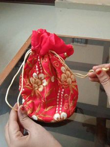 lowest price red and golden potli bag