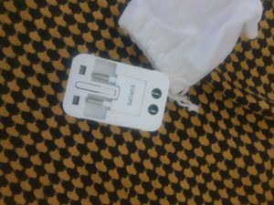 new unused travel friendly adaptor with pouch