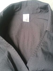 Black Sleeveless Surplice Top
