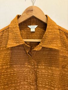 Beautiful Sleeveless Button-Up Shirt
