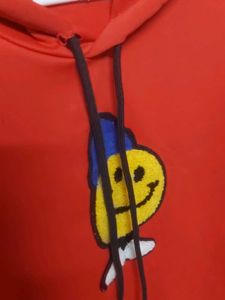 Red Hoodie With Smily Sticker
