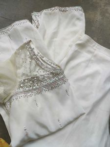 A White Short Kurti With Straight Pent